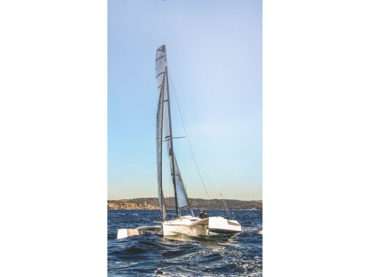 The Dragonfly 25 Sport seen bow-on, showing the central hull, raised amas and curved composite beams that allow the trimaran to fold down to a 2.3m beam. // Photo credit: Kevin Green