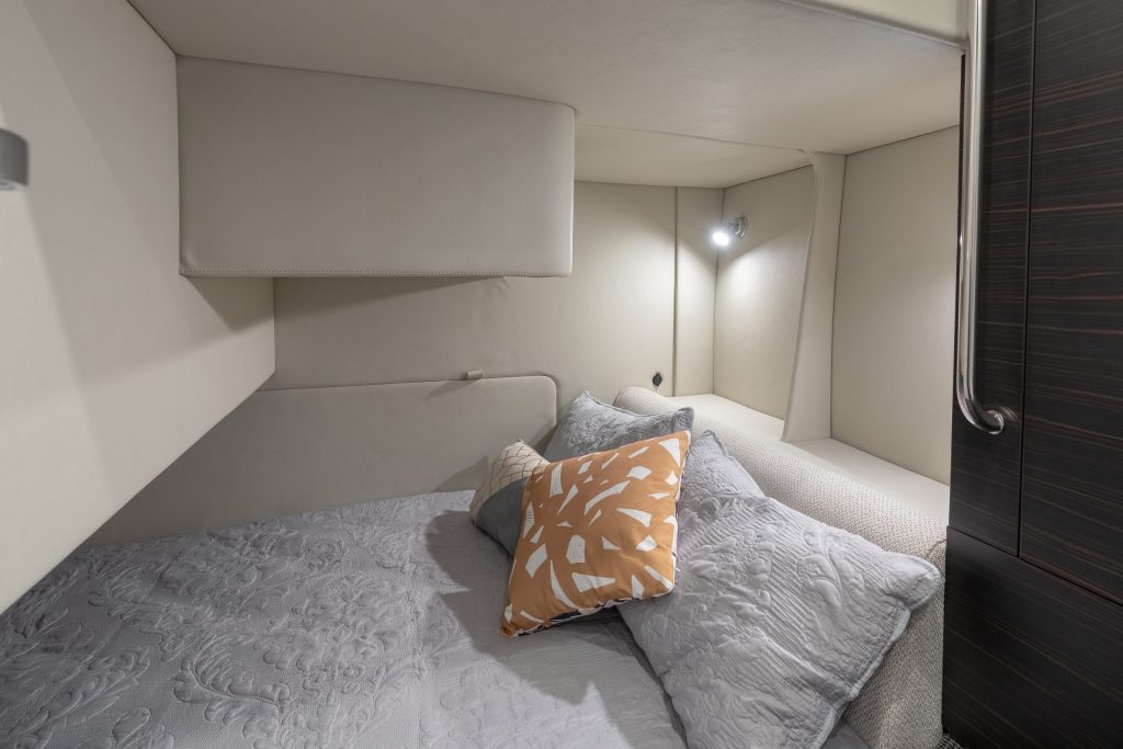 Belowdecks, there are two cabins, the master with a queen berth extending under the saloon sole. 