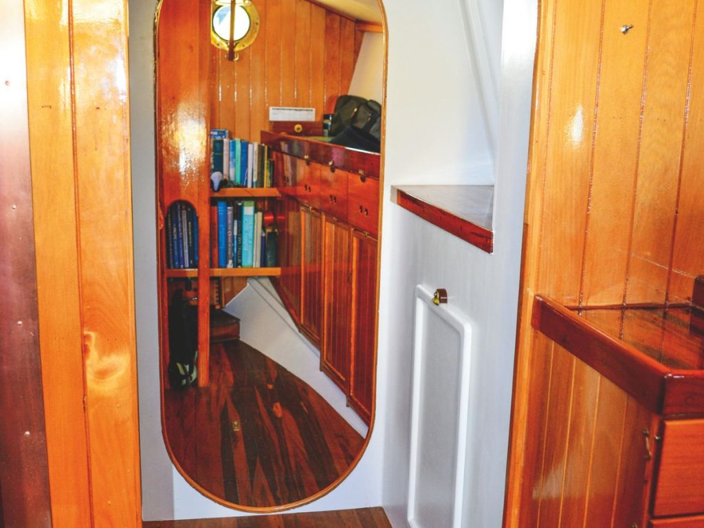 Plenty of recycled timber features in the boat’s interior; a decent-sized nav station; the heat from the wood burner enhances the cosy ambience