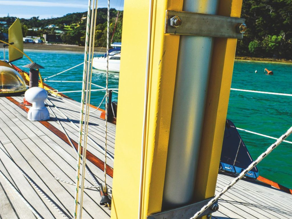 The 6hp Tohatsu, and the junk rig’s simple reefing lines; a dome helps to keep Annie dry when the weather’s foul.