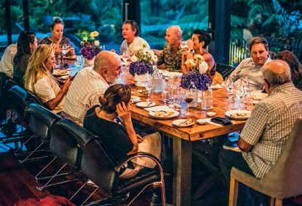 Grant prepares gourmet meals, embellishing the dining experience with information about the products and method of preparation.
