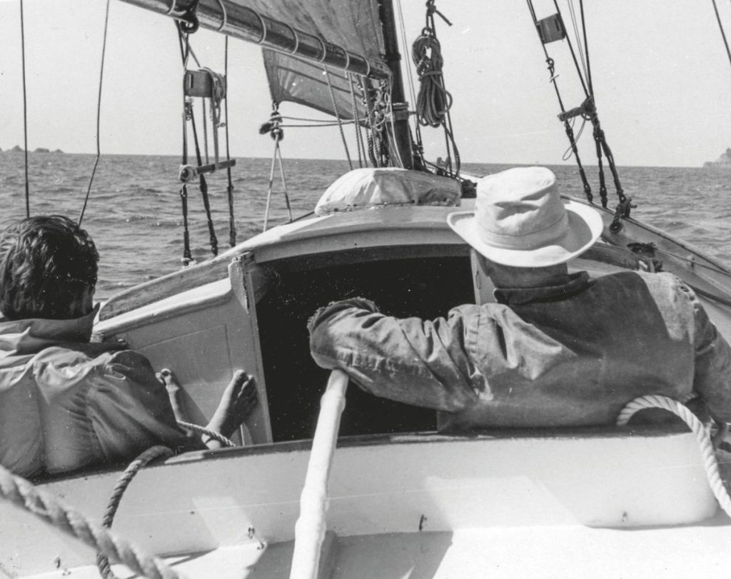 Harold at the tiller of Victory on a summer’s day. The explosion blew out the skylight under the cover and smashed the boom in two. One man and his boats: Harold George; Victory at war