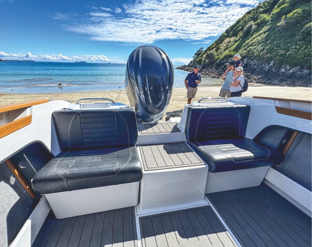 The transom step-through conceals the Anura pumps, motors and hydraulic reservoir under a moulded cover.