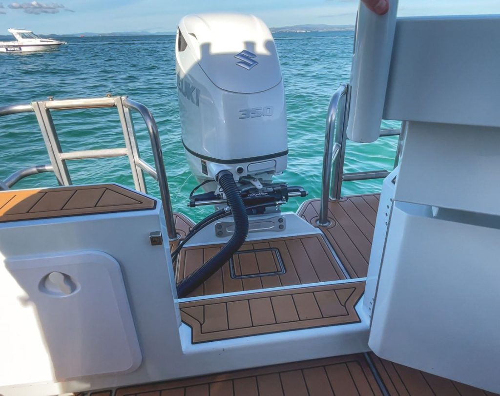 The Aluka 823 Walkaround transom area works really well with access in front of the engine across the full width of the platform. // Photo credit: Roger Mills / Boating New Zealand