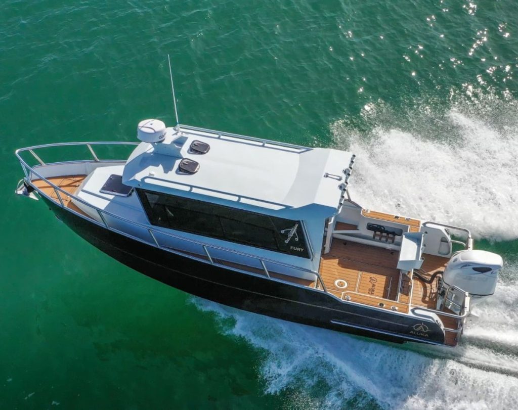 The Aluka 823 Walkaround is a handsome boat from most angles, its reverse sheer windscreen giving it a serious look. // Photo credit: Roger Mills / Boating New Zealand