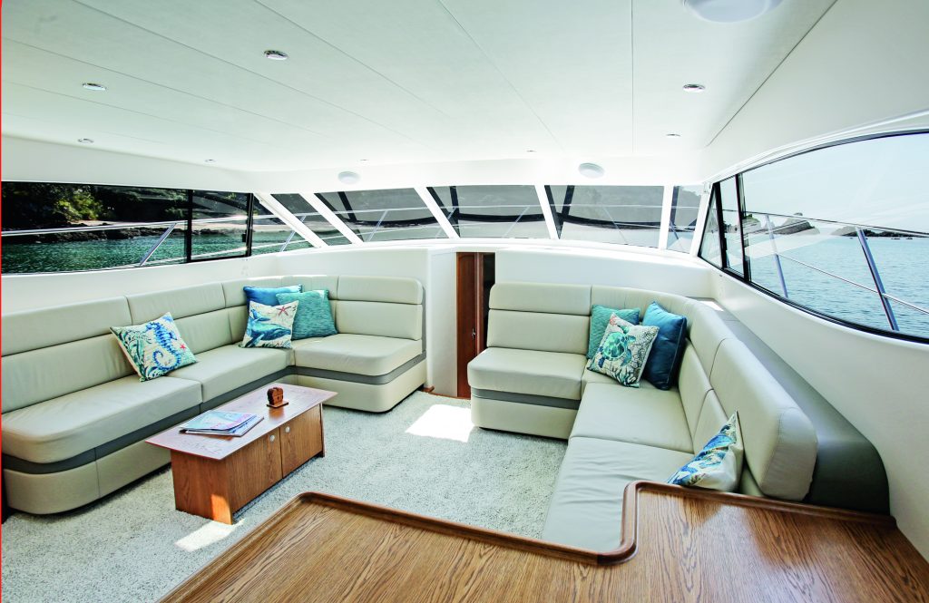 The main saloon is spacious and light; The details are what really sets this build apart. Bedrooms are sumptuous; The dining area and galley are just forward of the cockpit, inside the doors, with a guest cabin and day head on the port side.