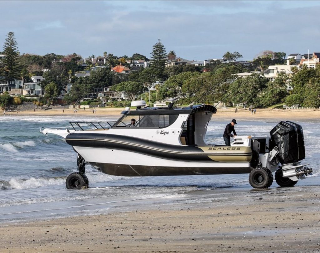 The full scale of the Sealegs 12RC is best appreciated on the beach. The surf rolling in on Takapuna Beach posed it no challenges. // Photo credit: Roger Mills / Boating New Zealand