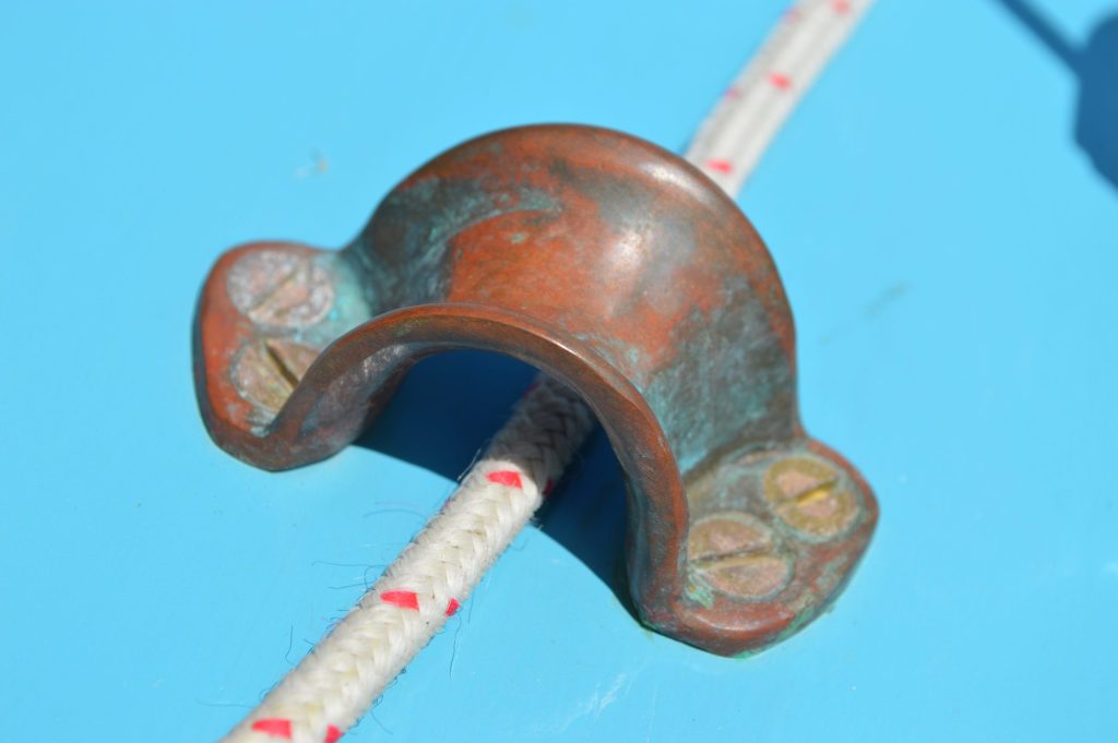 Fairlead, outhaul arrangement and a classic bronze mainsheet block – they’re all part of what makes Korora special. // Photo credit: Matt Vance