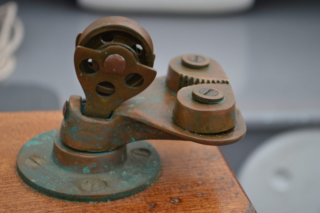 Classic Bronze mainsheet block, Fairlead, outhaul arrangement and a classic bronze mainsheet block – they’re all part of what makes Korora special. // Photo credit: Matt Vance