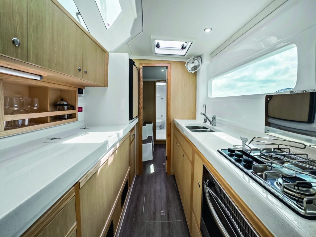 The Seawind 1170's galley is located in the starboard hull providing more space above in the saloon