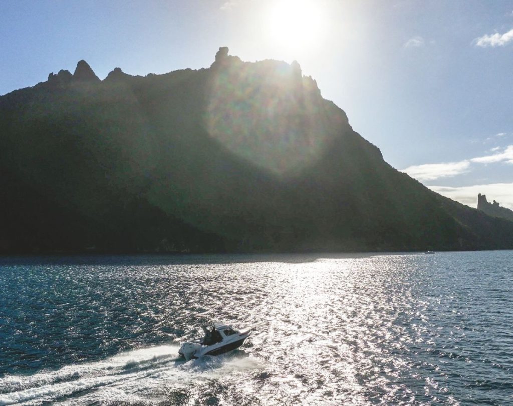 The Haines Hunter SP635 heading seawards with Bream Head on the port bow; The SP635 looks and feels well balanced. // Photo credit: Roger Mills