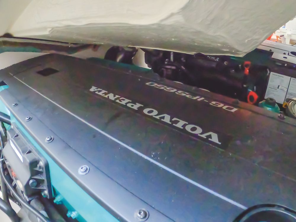 The helm console is well laid out with everything within reach and easy to see. The flybridge version we tested had the larger IPS 650 engine package and both models have remote anchoring. // Photo credit: Roger Mills