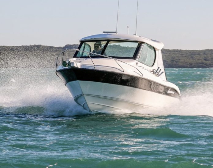 Wintry conditions on Buccaneer Six Fifteen test day; thank goodness for the snug hardtop. // Photo credit: Roger Mills / Boating New Zealand