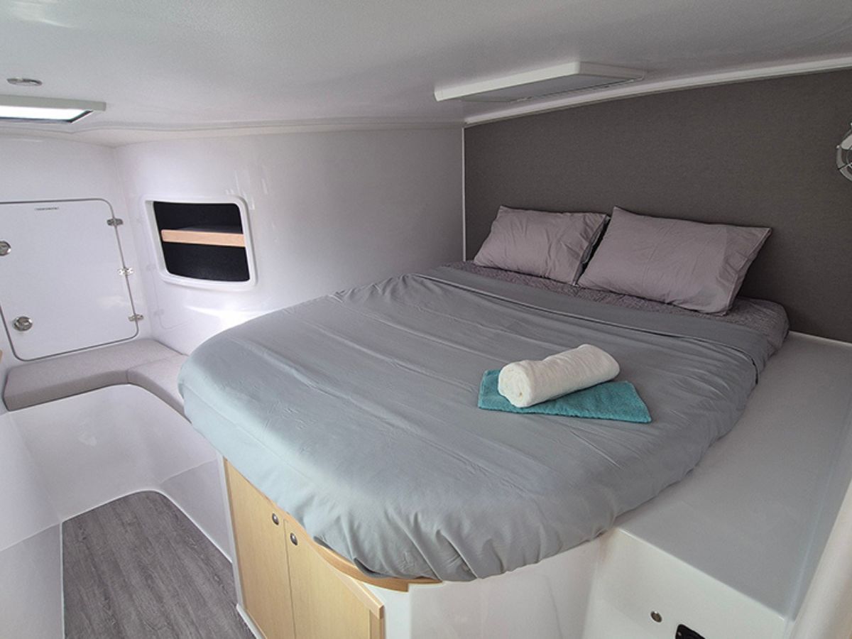 Step into a forward cabin and you’ll find a queen-size island berth, abundant storage, and bathrooms designed with liveaboard comfort in mind. // Supplied.