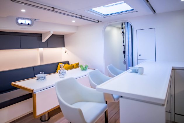 The saloon and galley on Eugen Seibold // Photo credit: YYachts, https://www.yyachts.de/