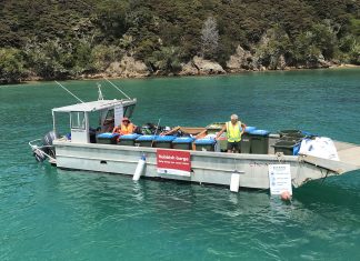Rubbish barge returns to the Bay of Islands for the summer boating season Rubbish barge returns to the Bay of Islands for the summer boating season