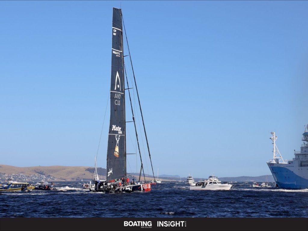 MASTER LOCK COMANCHE crosses the finish line in Hobart to claim line honours at the 2025 Rolex Sydney Hobart Yacht Race MASTER LOCK COMANCHE, Sail No: CAY007, Owner: Matt Allen/James Mayo - Charterers, Skipper: Matt Allen/James Mayo, Club: CYCA/RPEYC, NSW, Design: VPLP Verdier 100, LOA (m): 30.5, Year: 2014