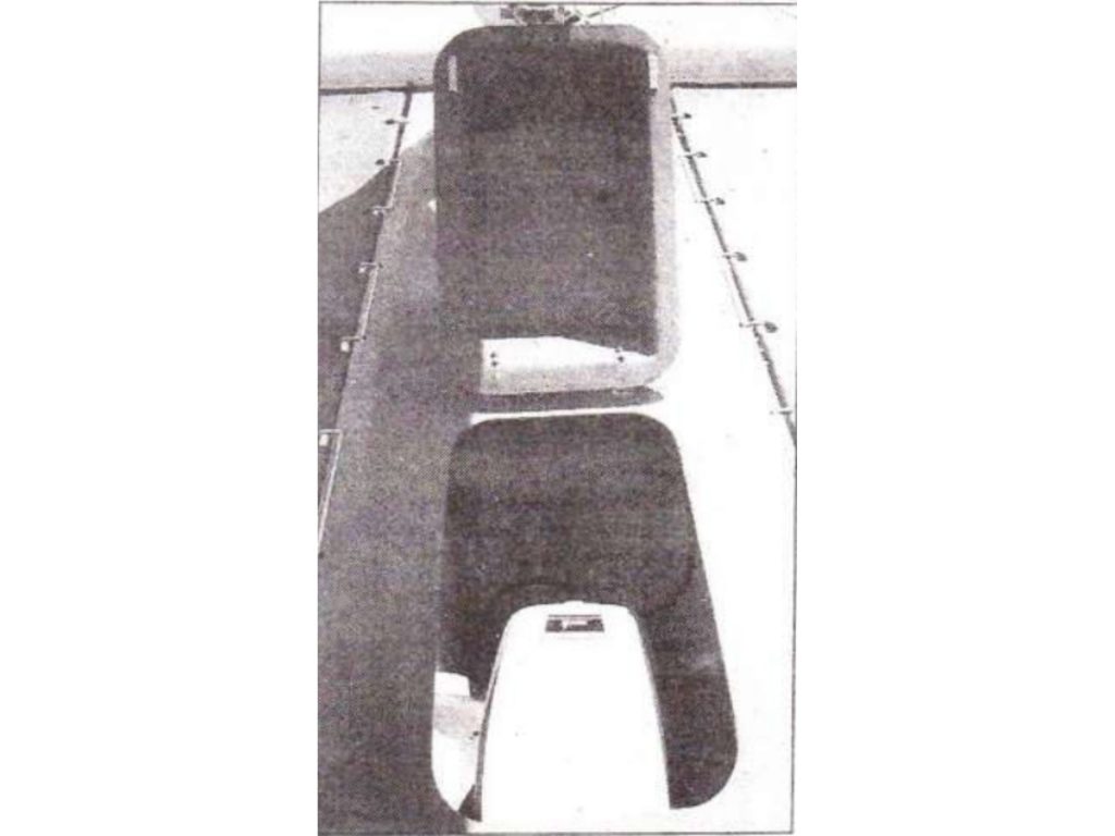 The extended central pod houses the outbound and halyard tails and then there's a separate bin for safety and cruising gear