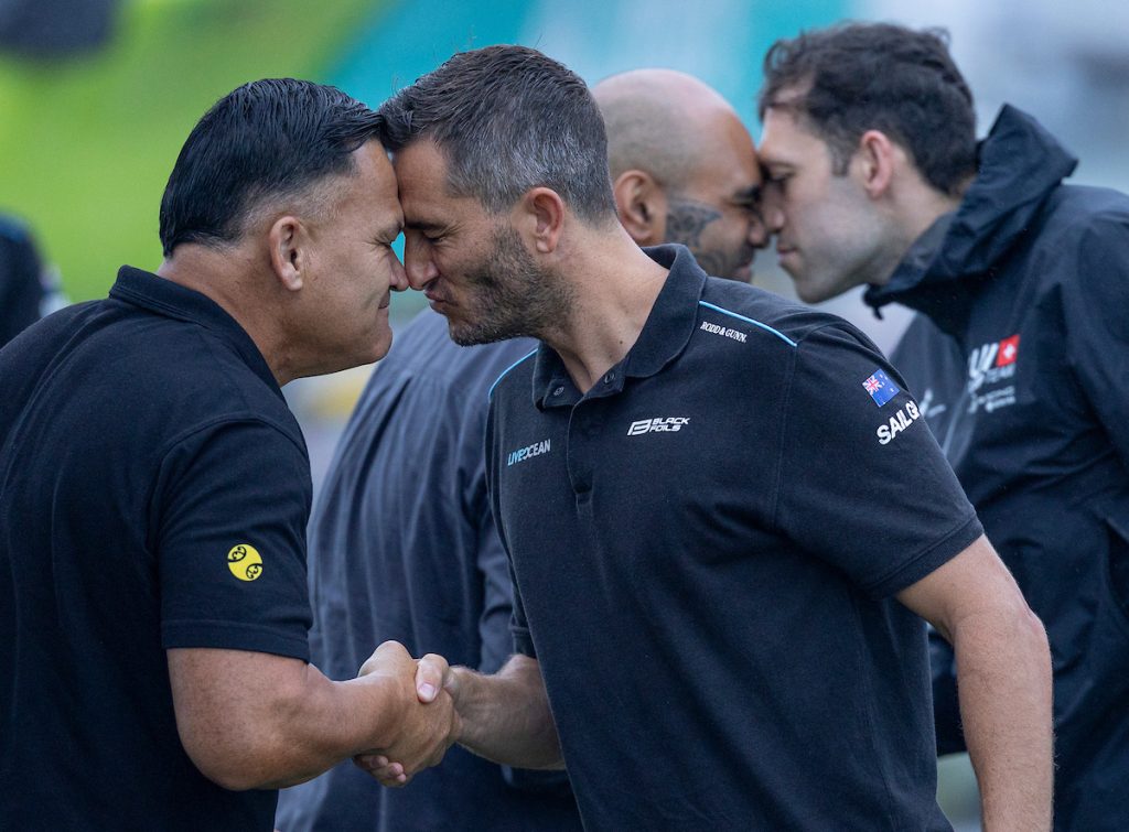 Blair Tuke, co-CEO and wing trimmer of Black Foils SailGP Team, touches heads and nose during the welcome ceremony hosted by Ngāti Whātua Ōrākei, the Tangata (people of the land), to mark the start of the ITM New Zealand Sail Grand Prix in Auckland, New Zealand. Friday 13 February 2026. Rolex SailGP Championship Event 2 2026 Season. // Photo credit: Felix Diemer for SailGP.