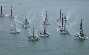 The SailGP F50 catamaran fleet with the Auckland Harbour Bridge in the background, on Race Day 1 of the ITM New Zealand Sail Grand Prix in Auckland, New Zealand. Saturday 14 February 2026. Rolex SailGP Championship Event 2 2026 Season. // Photo credit: Simon Bruty for SailGP.