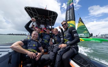 BONDS Flying Roos reclaim form with Auckland triumph (L-R) Kinley Fowler, grinder of BONDS Flying Roos SailGP Team, Tom Slingsby, driver of BONDS Flying Roos SailGP Team, Sam Newton, grinder of BONDS Flying Roos SailGP Team, Glenn Ashby, wing trimmer of BONDS Flying Roos SailGP Team, Tash Bryant, strategist of BONDS Flying Roos, and Jason Waterhouse, flight controller of BONDS Flying Roos SailGP Team, celebrate onboard the chief marshal boat following winning the event on Race Day 2 of the ITM New Zealand Sail Grand Prix in Auckland, New Zealand. Sunday 15 February 2026. Rolex SailGP Championship Event 2 2026 Season. // Photo credit: Felix Diemer for SailGP.