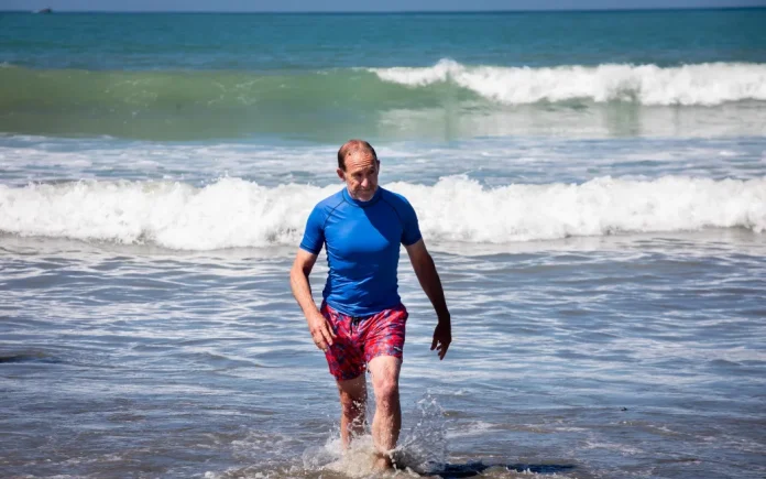The mayor comes out after a dip after the announcement. Photo credit- RNZ : Mark Papalii
