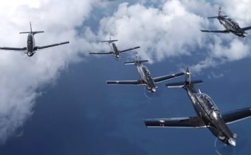 RNZAF No.14 Squadron Beechcraft T-6 Texans passed over during the 2026 NZ Antique & Classic Boat Show