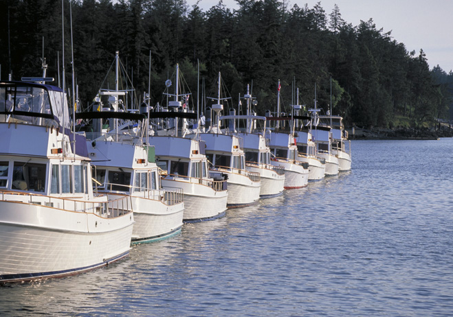 Line-up of old boats // Photo credit: Grand Banks Yachts