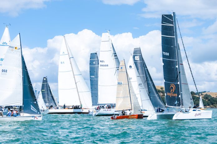 Fleet at the start of the 2025 PIC Harbour Classic, Waitematā Harbour (A vibrant fleet takes to the Waitematā Harbour as the PIC Harbour Classic returns this weekend) // Photo credit: Live Sail Die