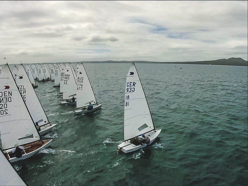 The start of an OK Worlds race off Takapuna 2019.