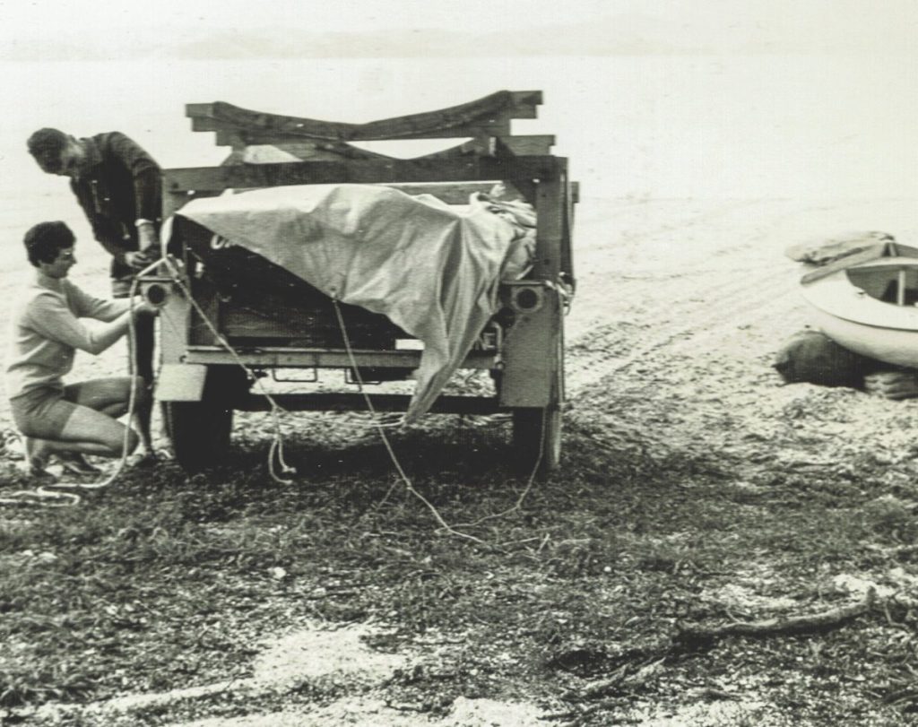 Sue Currie and Geoff Beaumont unloading their Zephyrs at Maraetai Beach Boating Club.