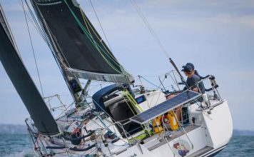 Now for sale, Kick, the Elliott 1050 cruiser racer with Round North Island pedigree Balanced on the helm and built to keep driving when conditions tighten. // Photo credit: Insight Media