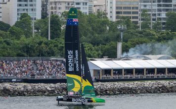 BONDS Flying Roos SailGP Team driven by Tom Slingsby in action by the grand stand and the adrenaline lounge on Race Day 1 of the ENEL Rio Sail Grand Prix in Rio de Janeiro, Brazil. Saturday 11 April 2026. Rolex SailGP Championship Event 4 2026 Season. // Photo credit: Ricardo Pinto for SailGP.
