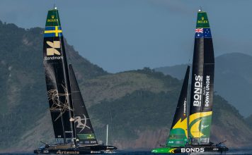 BONDS Flying Roos SailGP Team driven by Tom Slingsby ahead of Artemis SailGP Team driven by Nathan Outteridge, on Race Day 2 of the ENEL Rio Sail Grand Prix in Rio de Janeiro, Brazil. Sunday 12 April 2026. Rolex SailGP Championship Event 4 2026 Season. // Photo credit: Jason Ludlow for SailGP.