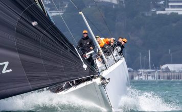 Steve Mair firmly at the helm of his Shaw 12, Clockwork // Photo credit: Roger Mills / Boating New Zealand