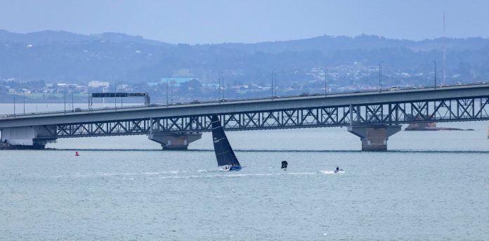 Motorboat III cross the finish line in the 2026 Three Kings Offshore Yacht Race. // Photo credit: Roger Mills / Boating New Zealand