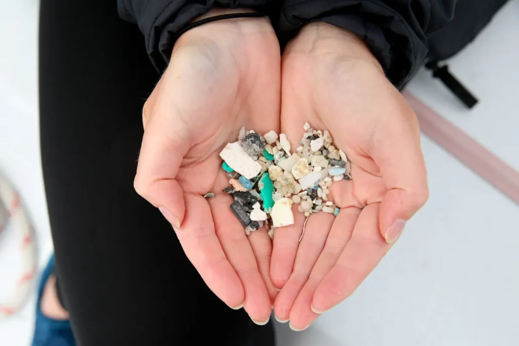 Plastic fragments found in the ocean are analysed with an FTIR which helps the crew establish the origin of the pollution, in Radio New Zealand article Kiwi joins all-female voyage to tackle plastics problem in the Pacific. Photo credit: eXXpedition