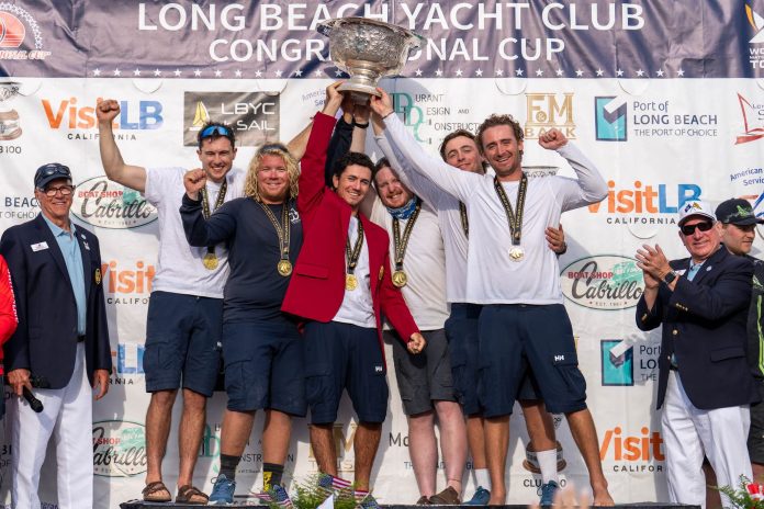 Cole Tapper (centre in Crimson Blazer) wins 2026 Congressional Cup with crew Jack Frewin, Max Brennan, George Richardson, Hamish Vass and Nathan Guliksen. / 2026 LBYC Congressional Cup, Day 5. Long Beach Yacht Club, Long Beach, CA. May 03, 2026. // Photo credit: Ian Roman/WMRT