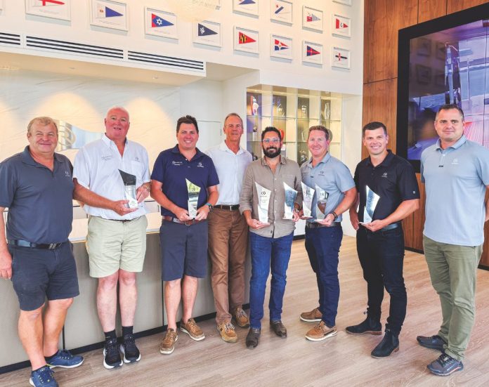 Celebrating excellence within the Riviera Australasian dealership network. From left Peter Welch – Riviera, Michael Joyce – R Marine Sydney, Ben Leigh-Smith – R Marine Crawley, Rodney Longhurst – Riviera, Ben Crawley and Travis Edney – R Marine Crawley, Ryan Lloyd – R Marine Perth, and Peter Wheeler – Riviera. // Supplied