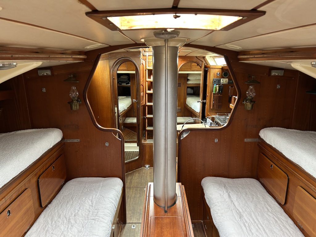 The traditional timbers against the white upholstery make for a clean and tidy interior. // Supplied