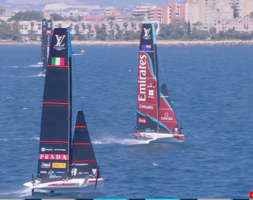 Louis Vuitton Sardinia Preliminary Race 4 finish line, Luna Rossa principal boat slightly behind ETNZ principal boat // America's Cup media