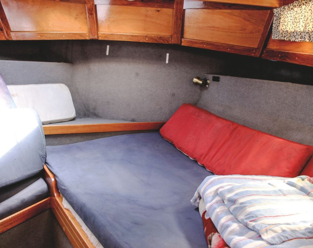 Where possible, he kept the boat’s interior true to the original Careys Boatyard conversion, but the galley now features a Wallas diesel cooktop. // Photo credit: Kevin Cudby / Boating New Zealand 