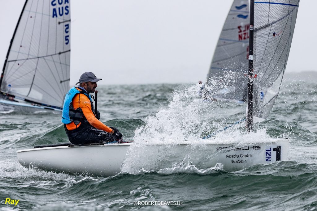 Ray Hall at the helm of NZL1, NZ Finn Team // Photo credit: Robert Deaves