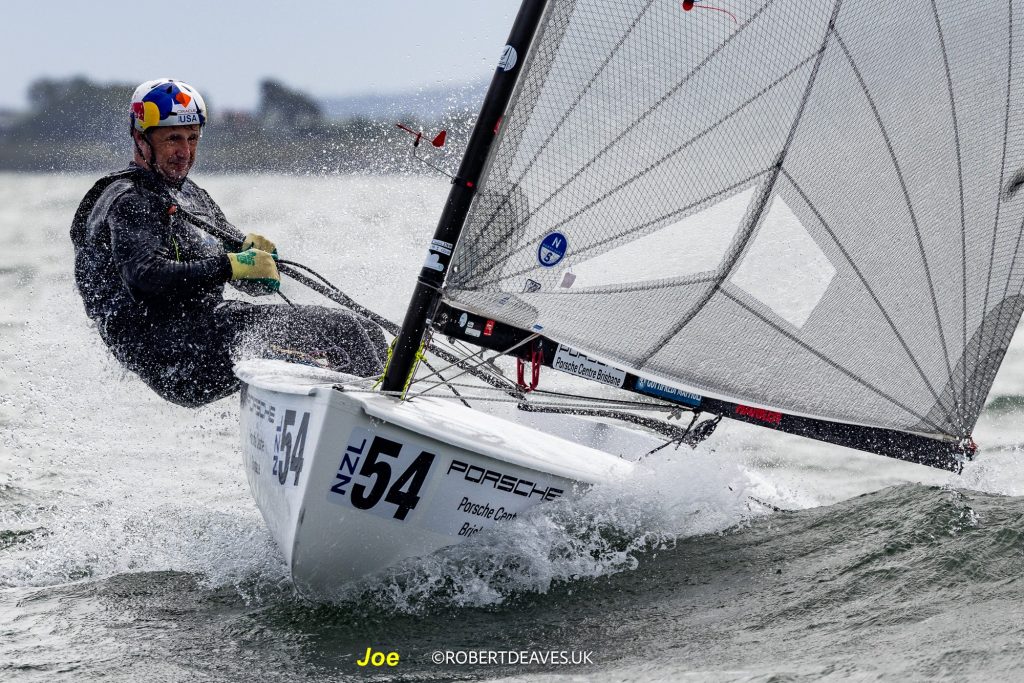 Joe Spooner at the helm of NZL54, NZ Finn Team // Photo credit: Robert Deaves