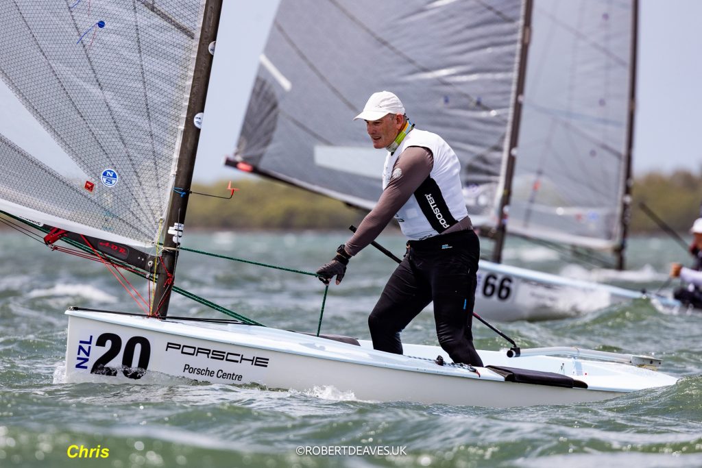 Chris Wells at the helm of NZL20, NZ Finn Team // Photo credit: Robert Deaves