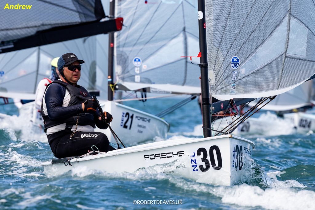 Andrew Duncan at the helm of NZL30, NZ Finn Team // Photo credit: Robert Deaves