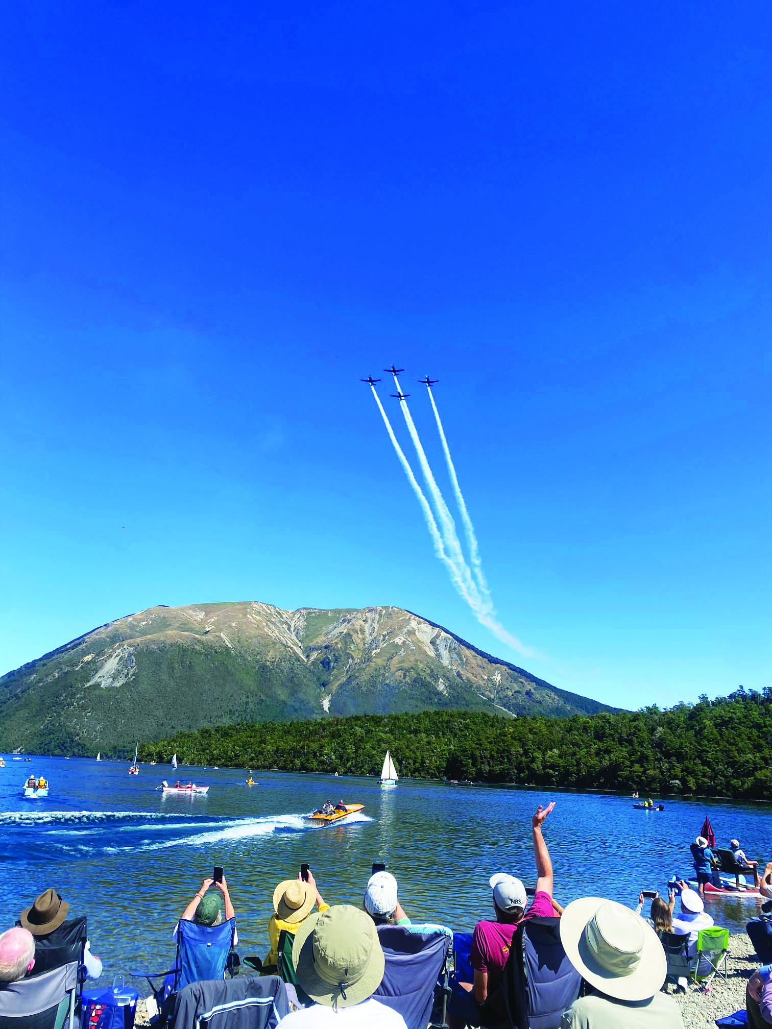 T-6 Texan flyby and the Marlborough Solitaire, Boating NZ Retro Boat Trophy winner. // Photo credit: supplied.