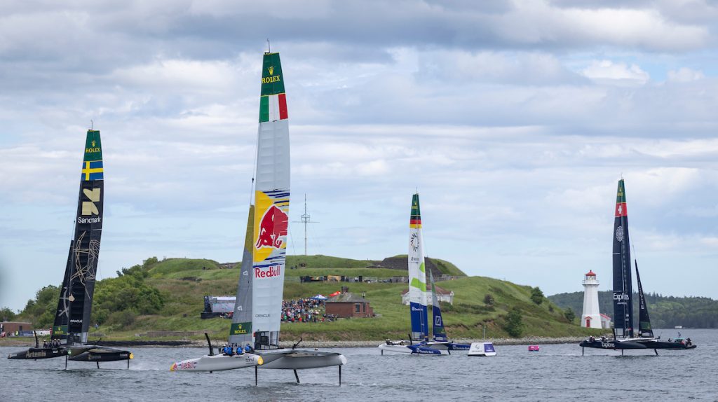 Artemis SailGP Team driven by Nathan Outteridge leads Red Bull Italy SailGP Team driven by Phil Robertson, Germany SailGP Team presented by Deutsche Bank driven by Erik Kosegarten Heil and Explora Journeys Swiss SailGP Team driven by Sebastien Schneiter on Race Day 1 of the Canada Sail Grand Prix in Halifax, Canada. Saturday 20 June 2026. Rolex SailGP Championship Event 7 2026 Season. // Photo credit: Jed Jacobsohn for SailGP.