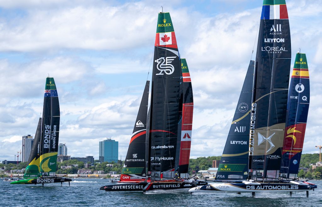 BONDS Flying Roos SailGP Team driven by Tom Slingsby leads NORTHSTAR SailGP Team driven by Giles Scott, ROCKWOOL Racing SailGP Team driven by Nicolai Sehested, DS Automobiles SailGP Team France and Los Gallos SailGP Team driven by Diego Botin on Race Day 2 of the Canada Sail Grand Prix in Halifax, Canada. Sunday 21 June 2026. Rolex SailGP Championship Event 7 2026 Season. // Photo credit: Samo Vidic for SailGP.