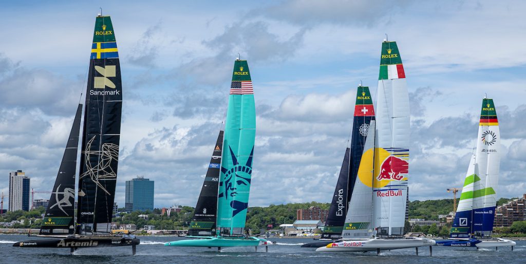 Artemis SailGP Team driven by Nathan Outteridge leads United States SailGP Team driven by Taylor Canfield, Red Bull Italy SailGP Team driven by Phil Robertson, Explora Journeys Swiss SailGP Team driven by Sebastien Schneiter and Germany SailGP Team presented by Deutsche Bank driven by Erik Kosegarten Heil on Race Day 2 of the Canada Sail Grand Prix in Halifax, Canada. Sunday 21 June 2026. Rolex SailGP Championship Event 7 2026 Season. // Photo credit: Samo Vidic for SailGP.